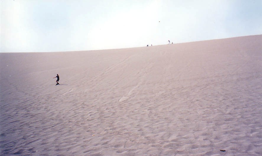 San Pedro de Atacama, Northern Chili  - Sandboarding down giant sand dunes at Mach 3! The walk back up, only Mach 2...