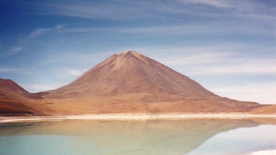 Travelling from Bolivia into Chili - the Salt Lake reflects the massive volcano (Editor's note: so cool!)